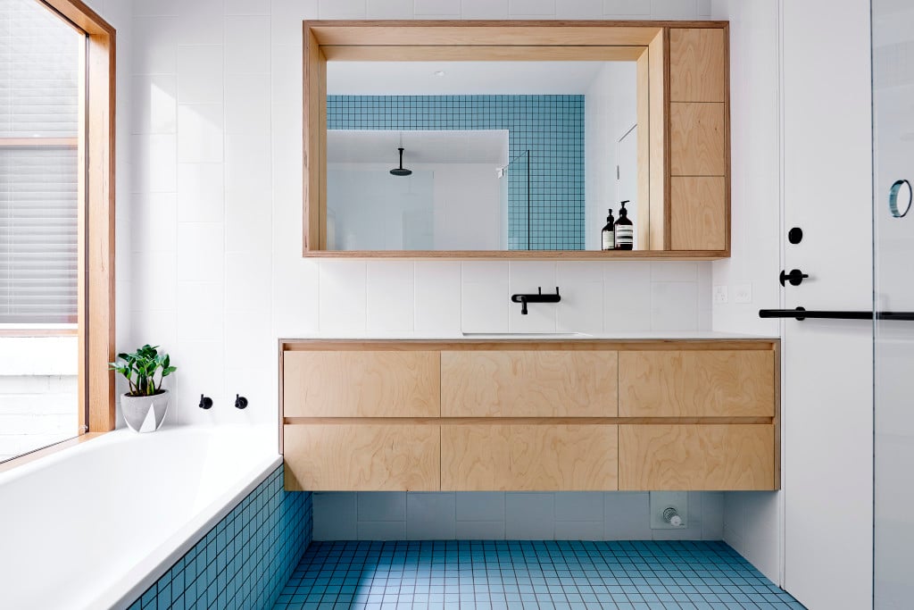 baby blue square tiles and light wood in this modern bath renovation | via coco kelley