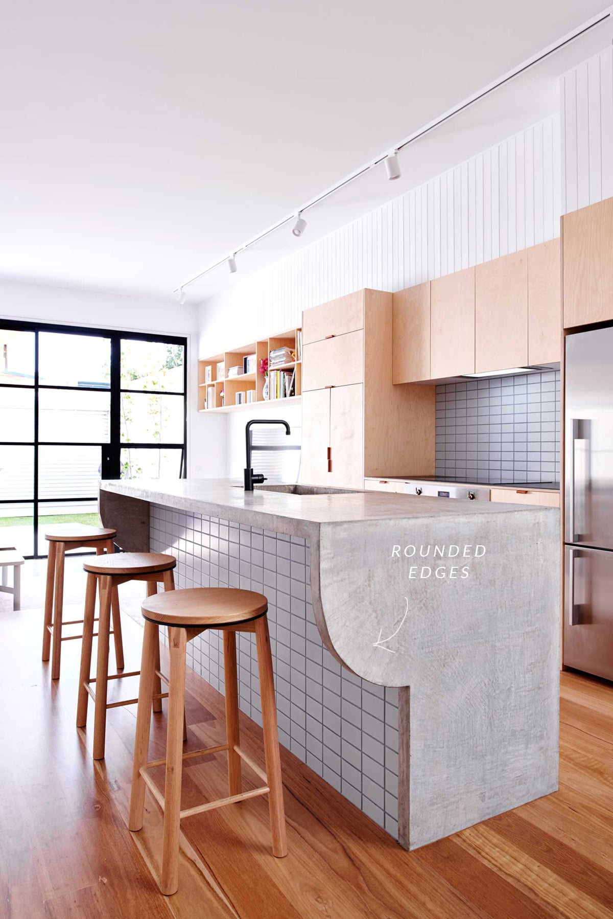 a modern kitchen renovation with cool concrete detail | via coco kelley