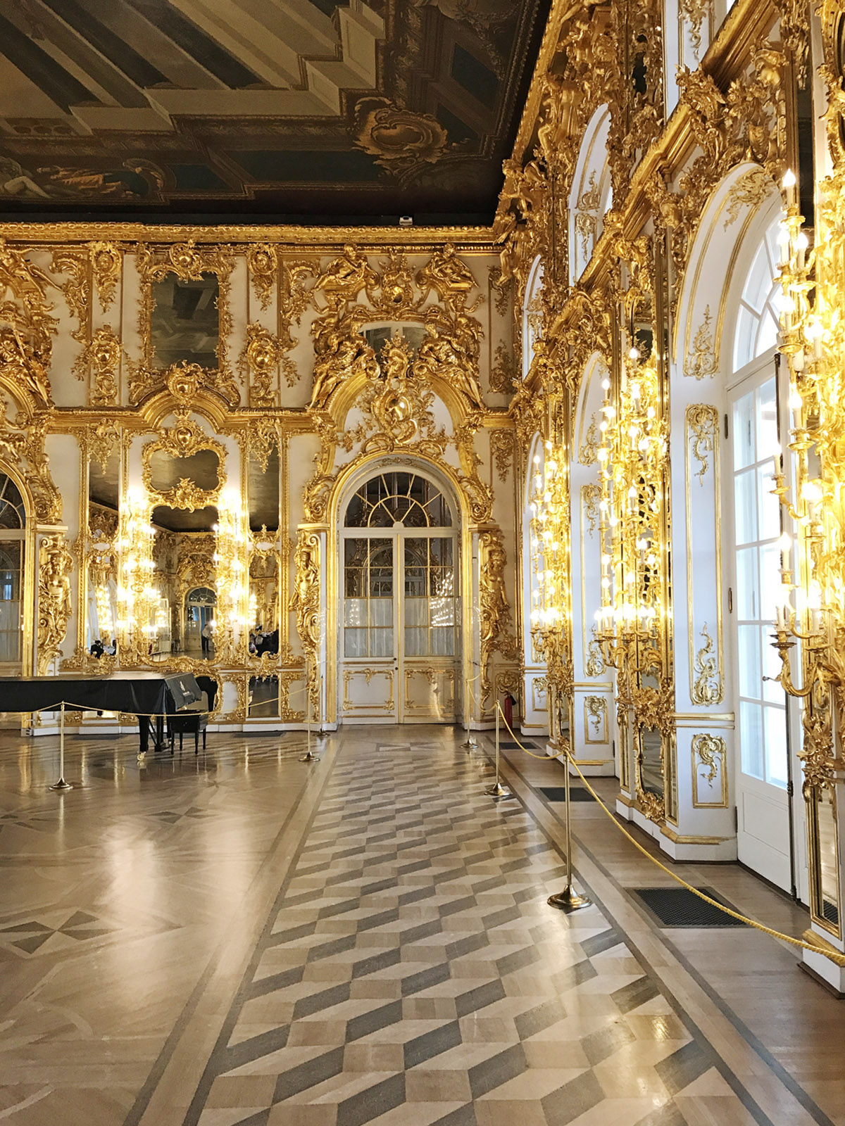 the gilded ballroom of Catherine's Palace | St. Petersburg travel guide on coco kelley
