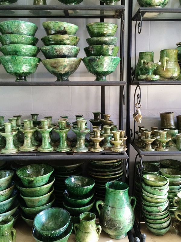 classic green glazed pottery at the souks in marrakech | coco kelley