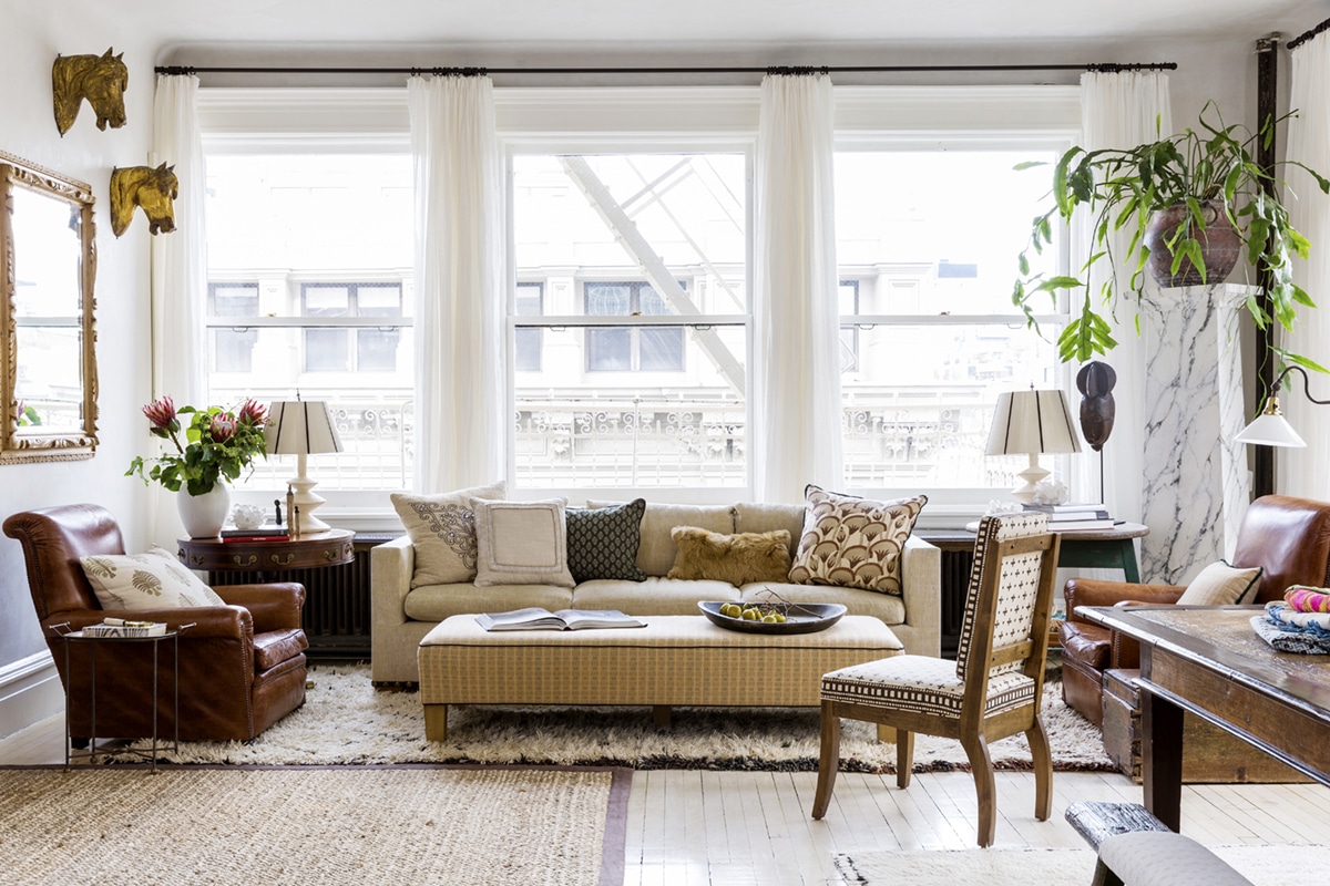 layered textiles and antiques in a fresh living room space by katie leede | coco kelley