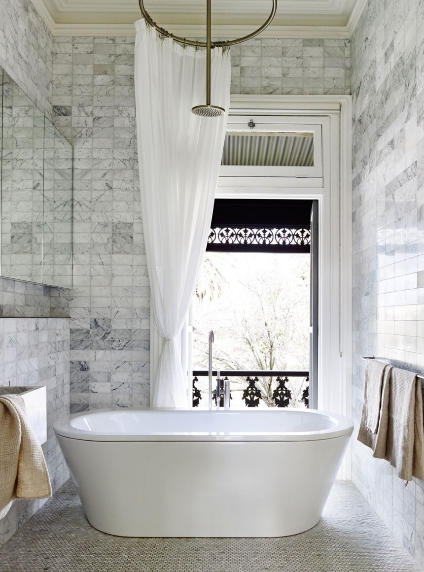stunning master bath with marble tile | house tour on coco kelley
