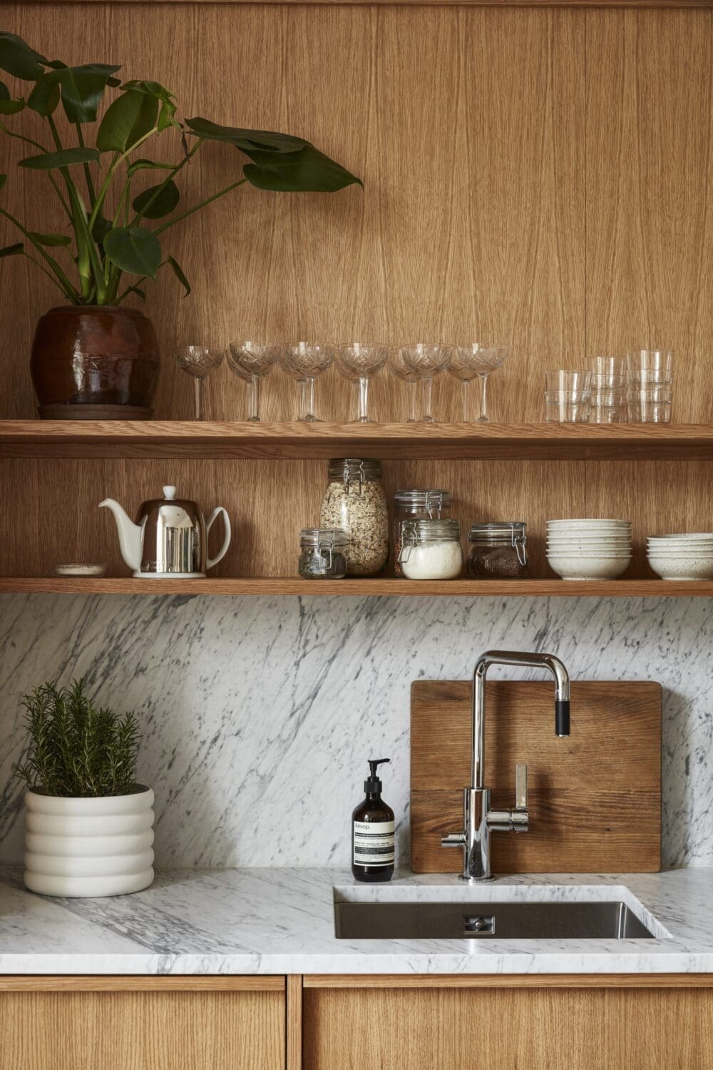 marble backsplash with floating wood shelves modern kitchen