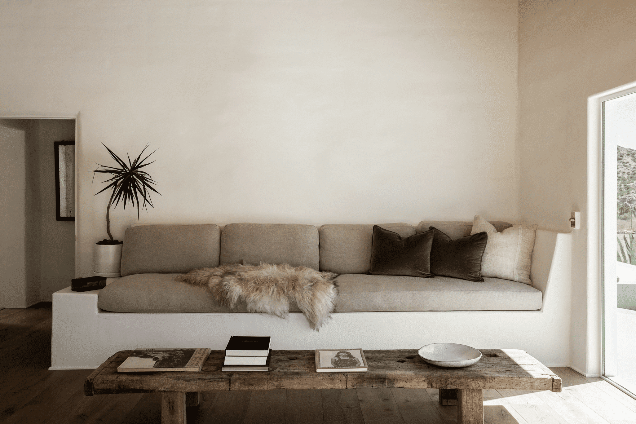 modern desert adobe house tour living room built in sofa