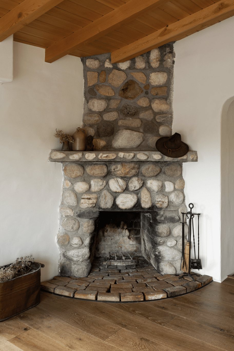 modern desert adobe house tour stone fireplace