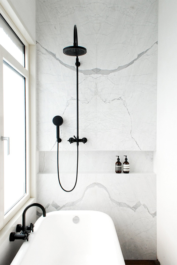 white marble + black fixtures in the bath // via coco kelley