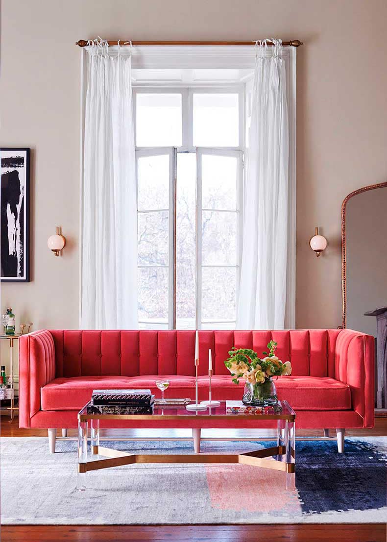 a bright coral sofa - roundup of colorful sofas on coco kelley