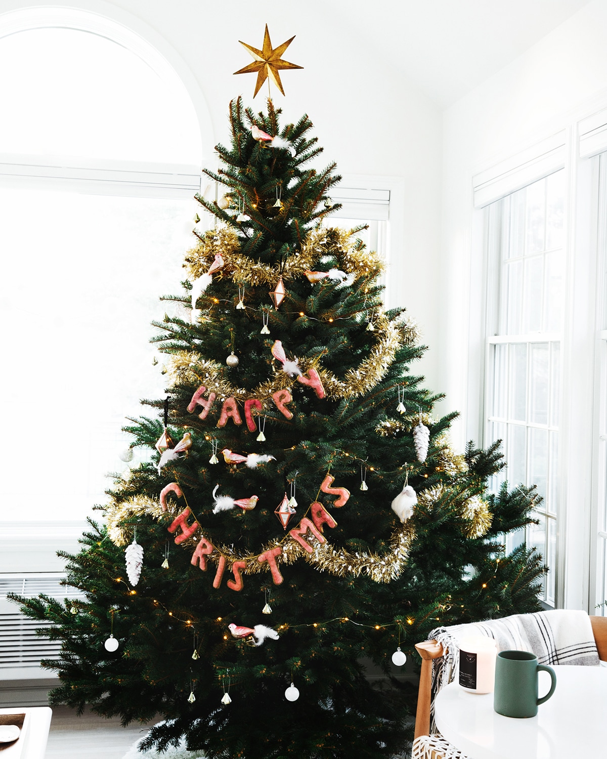 a classic christmas tree with happy christmas garland by Better Happier | our favorite holiday home decor moments on coco kelley