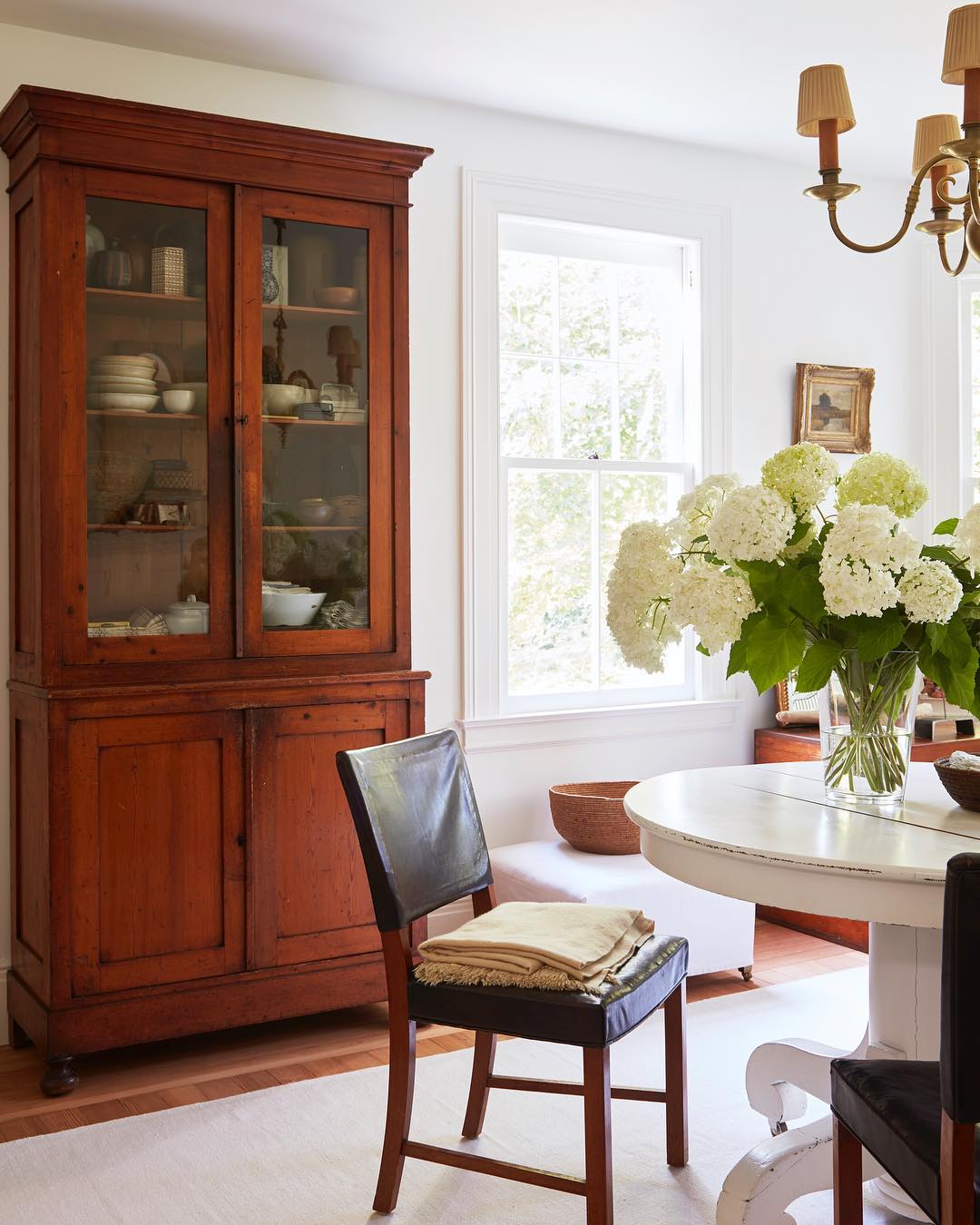 a classic connecticut cottage in white and wood-dining room detail-coco kelley-house-tour