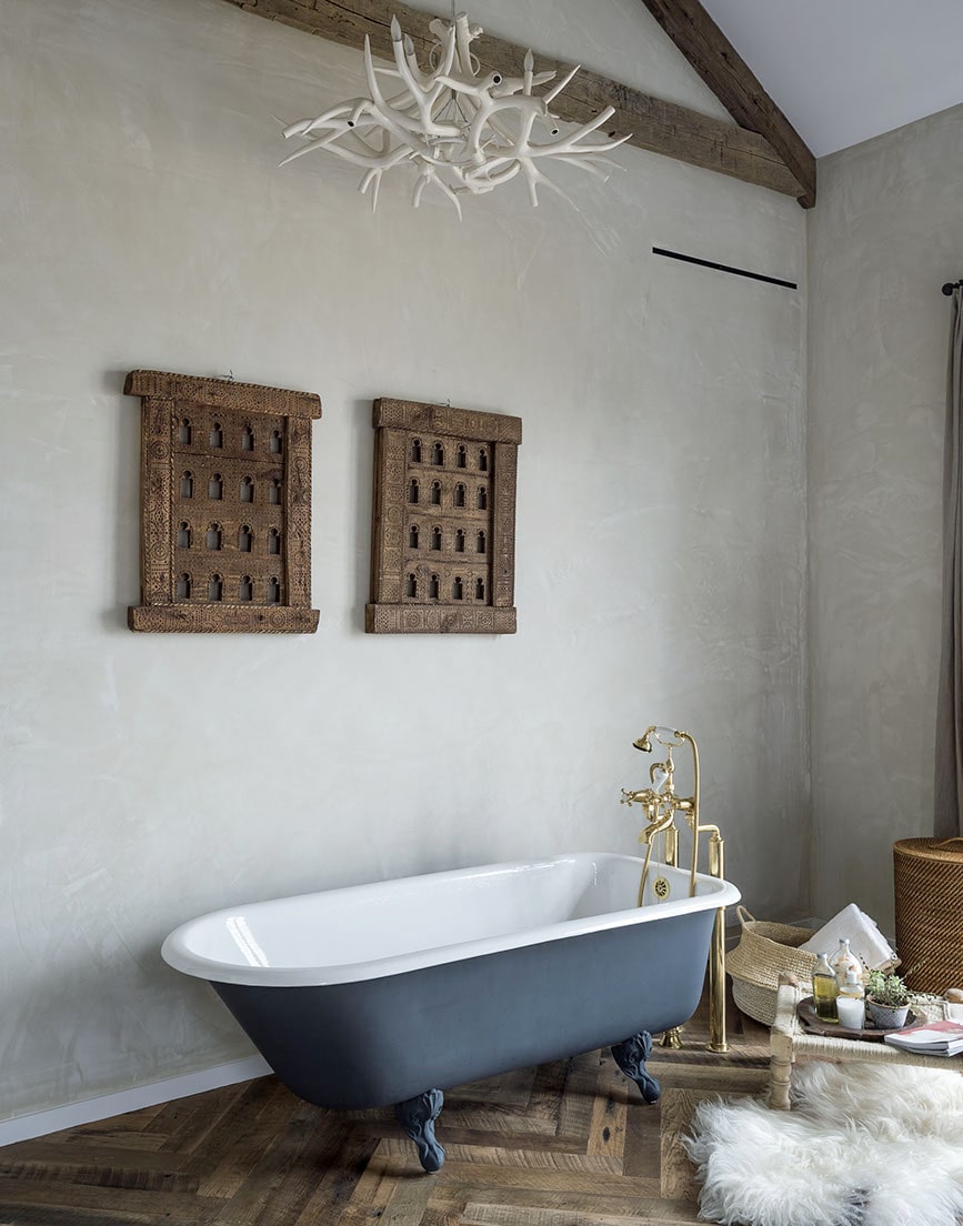 a clawfoot bathtub in the master bedroom | tour this full home on coco kelley
