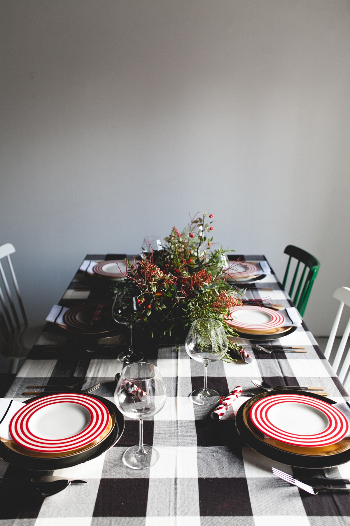 a cozy cabin inspired christmas tabletop with buffalo plaid and red stripes | coco kelley