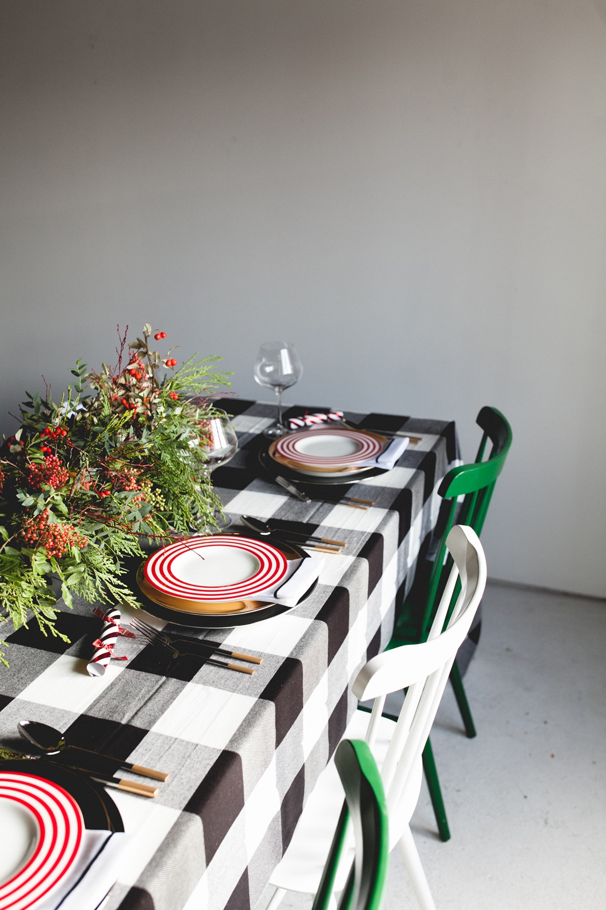 a cozy cabin inspired christmas tabletop with buffalo plaid and red stripes | coco kelley