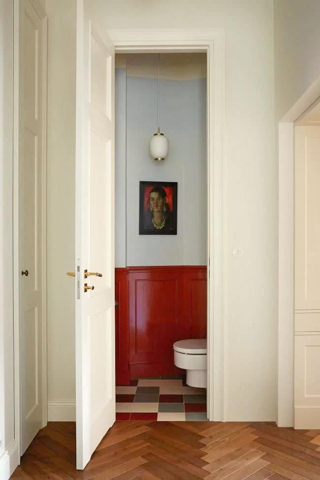 a fun two-tone bathroom in blue and red | polish prewar apartment tour on coco kelley