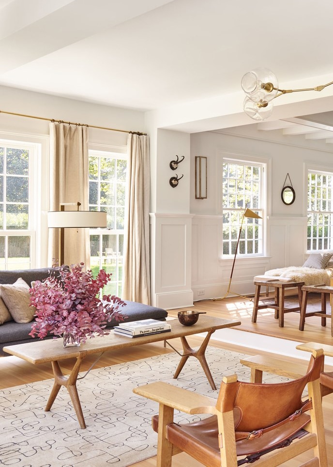 an expansive living room features warm neutrals and tons of light | pilar guzman house tour via coco kelley