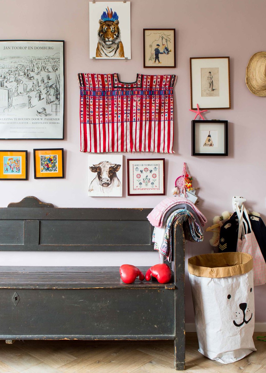 a pink children's room with antique storage and fun gallery wall | full house tour on coco kelley