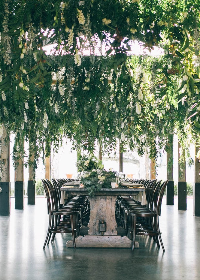 stunning wedding inspiration with lush greens | table setting by the stye co via coco kelley