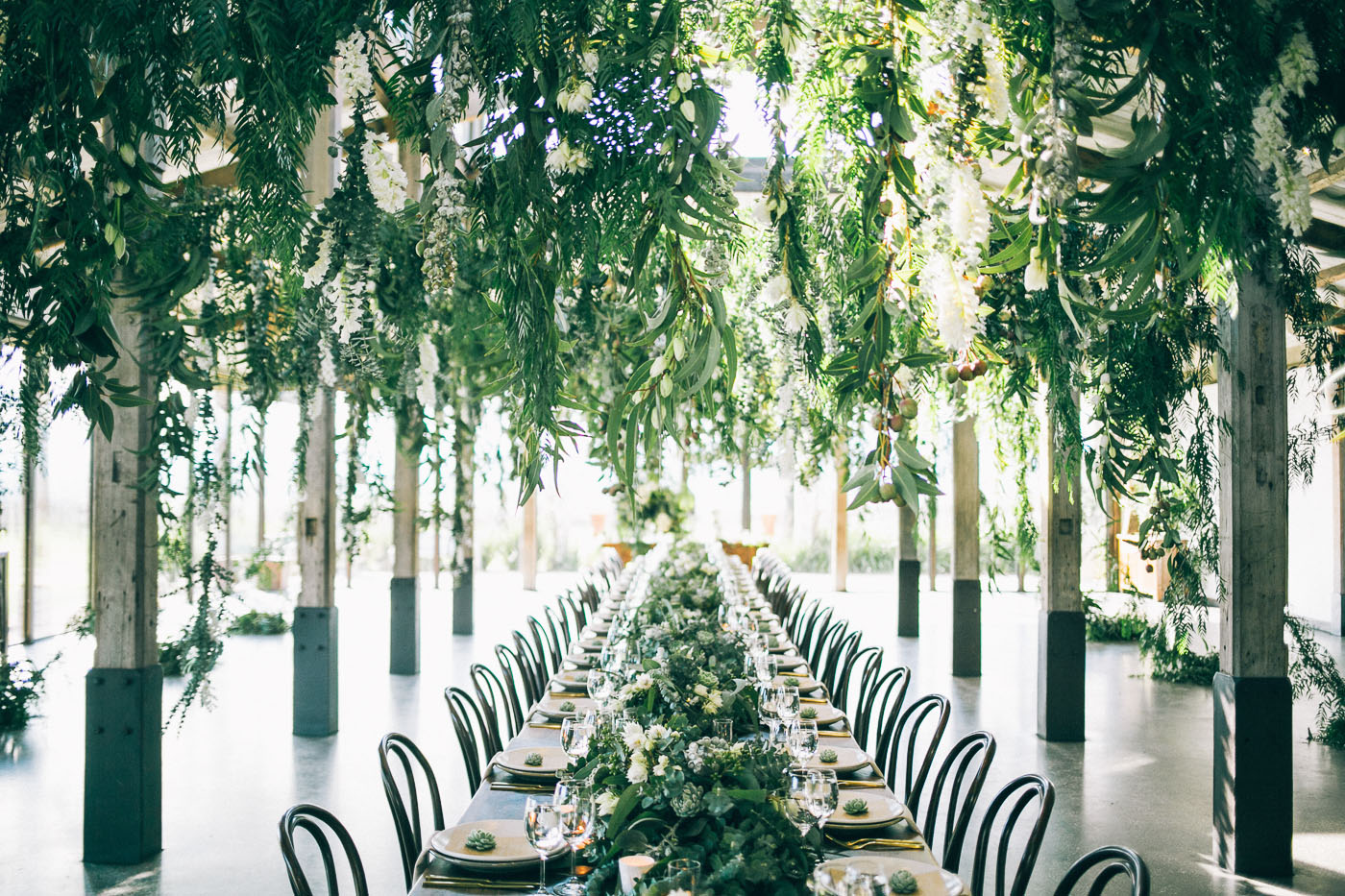 stunning wedding inspiration with lush greens | table setting by the stye co via coco kelley