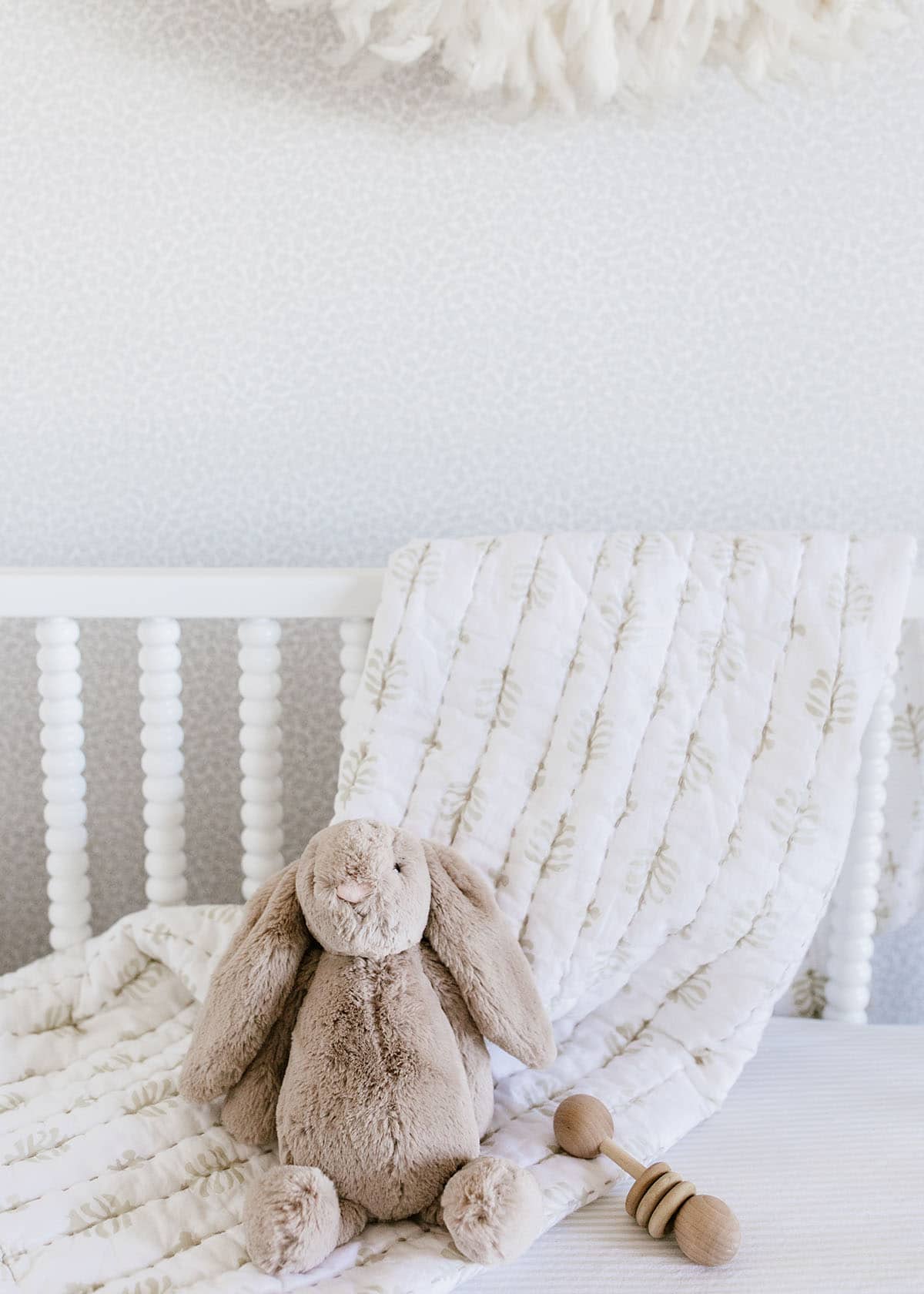 a sweet neutral crib for bebe with serena & lily quilt | coco kelley