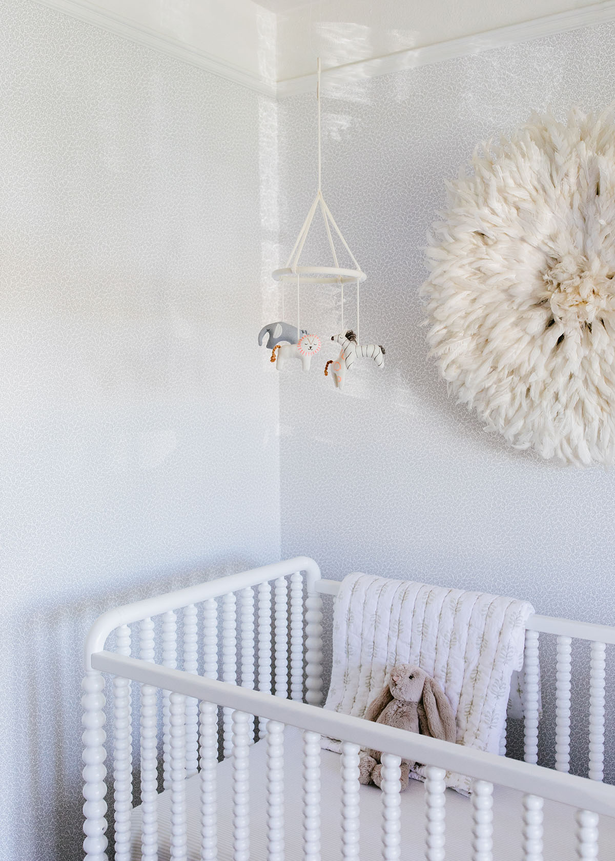 a vintage inspired neutral nursery with wallpaper | coco kelley