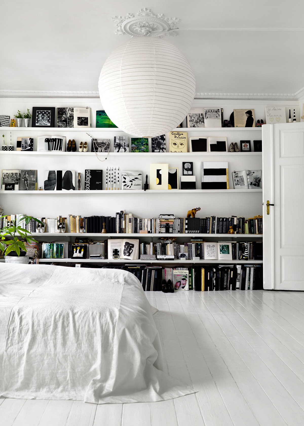 all white bedroom with floating shelves | coco kelley