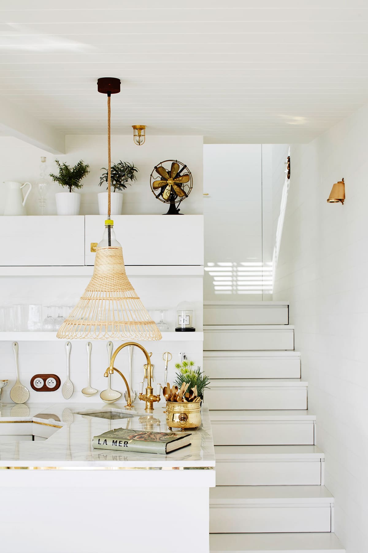 an all white palette, beautiful details and creative use of small space in this tiny riviera home | house tour on coco kelley