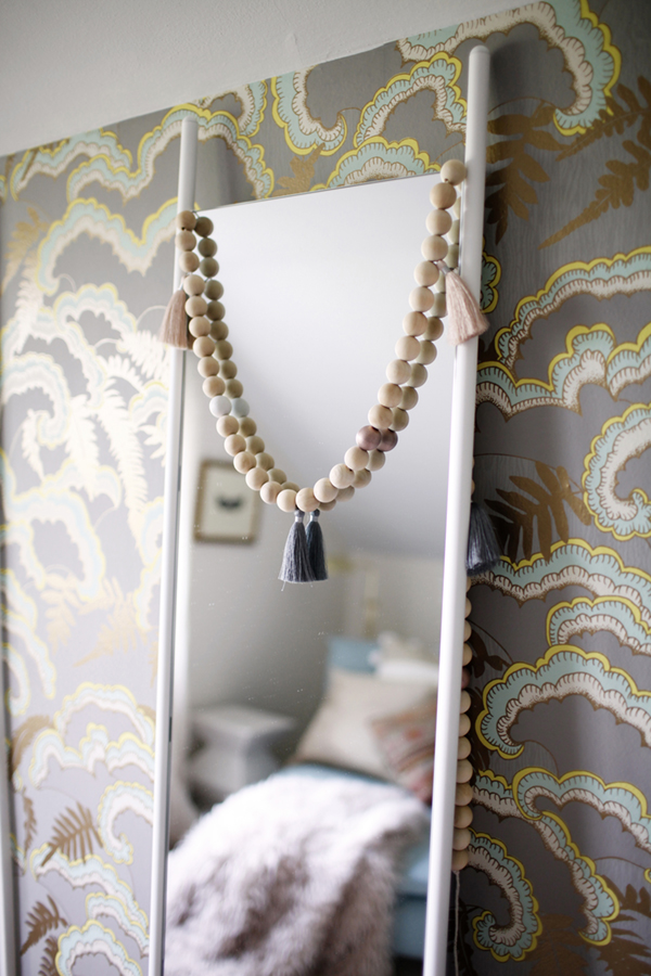 fun wallpaper and mirror details in an attic closet dressing room | via coco+kelley