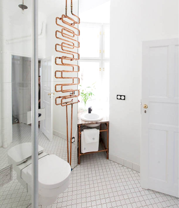 the Autor Rooms hotel in Warsaw modern white bathroom with exposed copper | via coco+kelley
