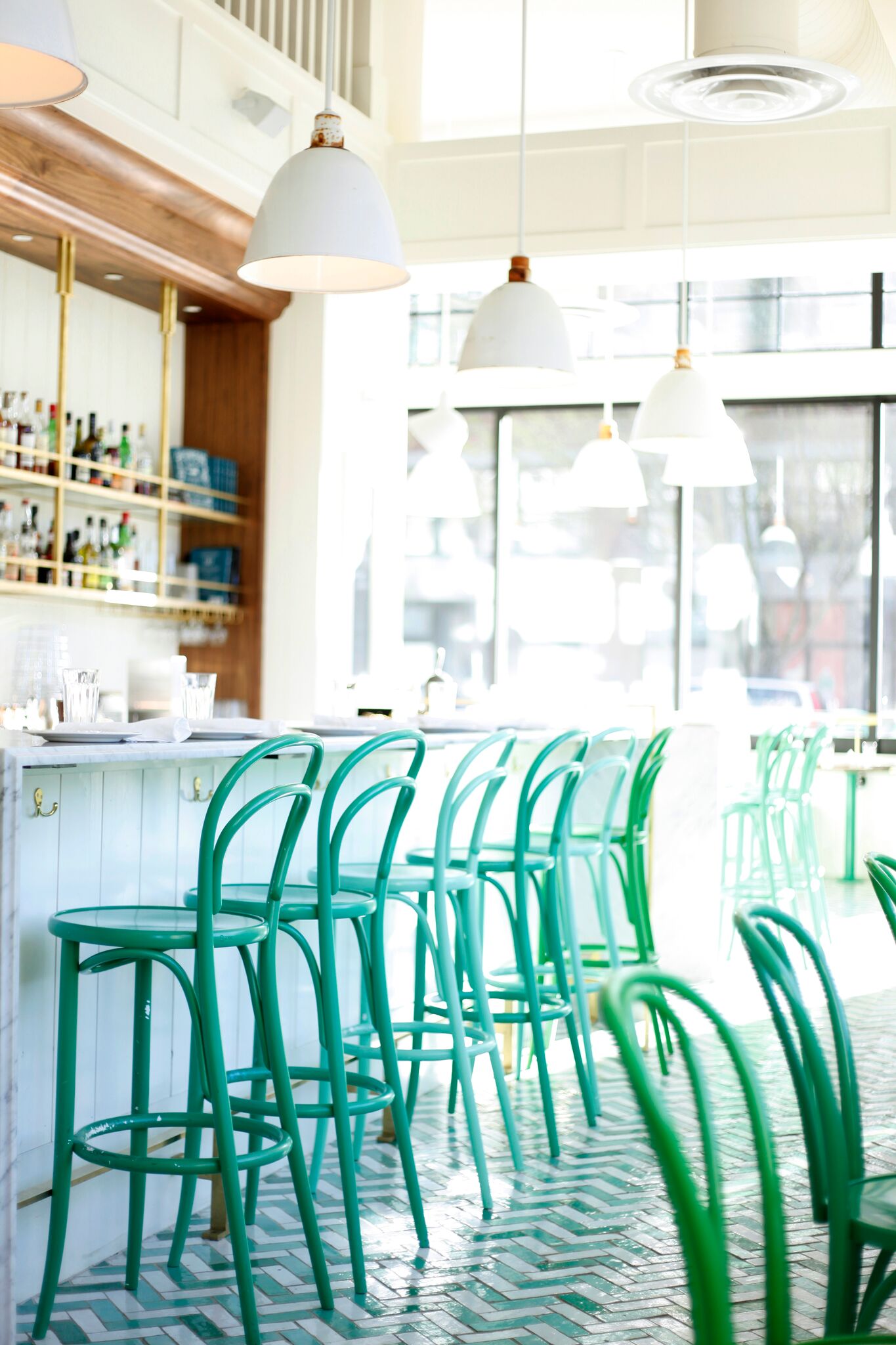 tour this gorgeous green and white bar in seattle | bar melusine via coco kelley