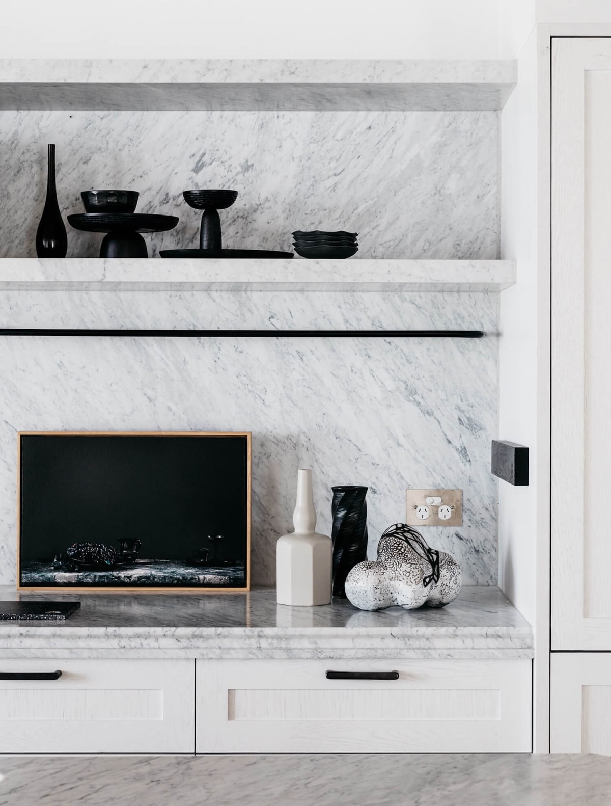 black accents in a modern marble kitchen | room of the week coco kelley