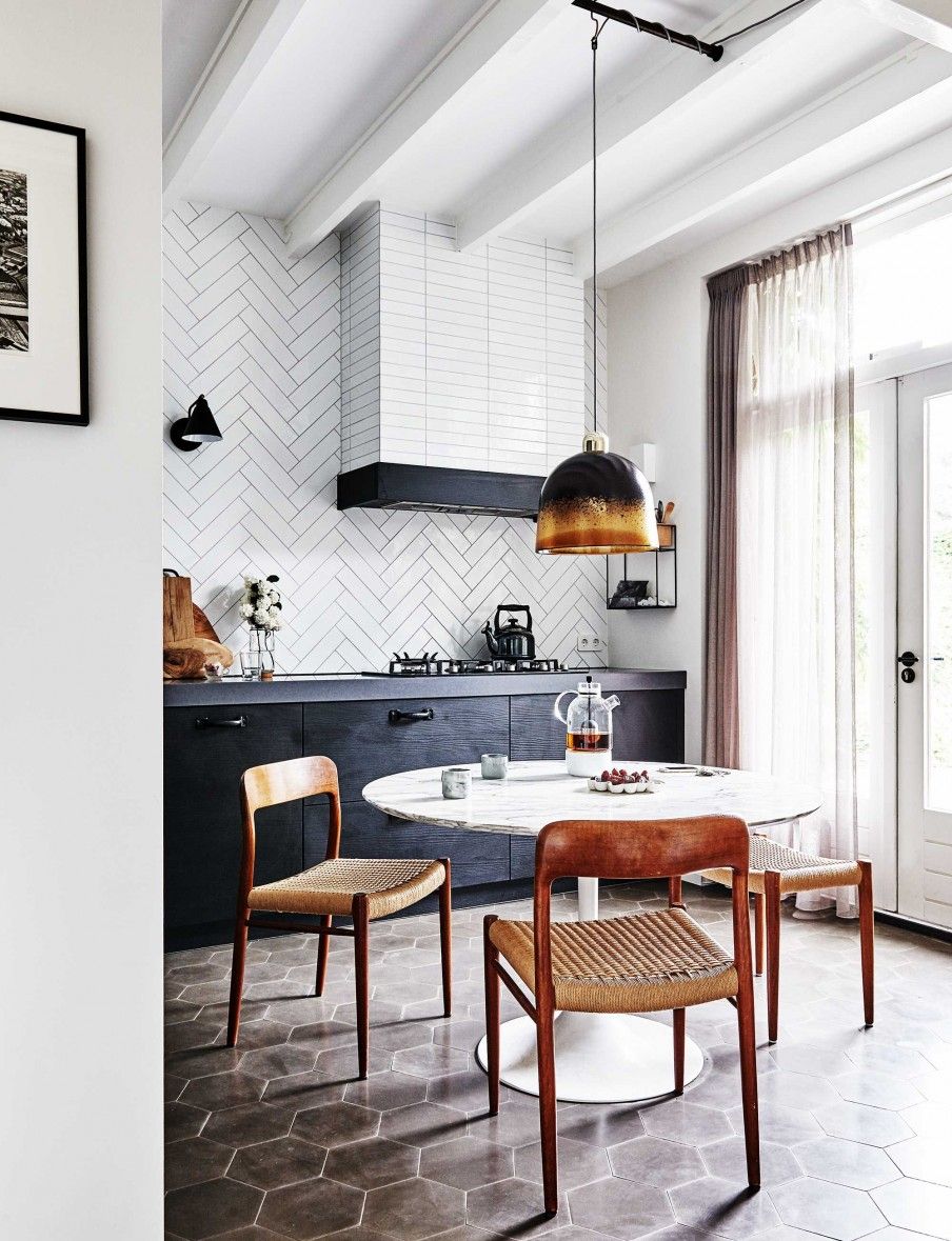 black and white kitchen and eat-in dining room | modern terracotta floors