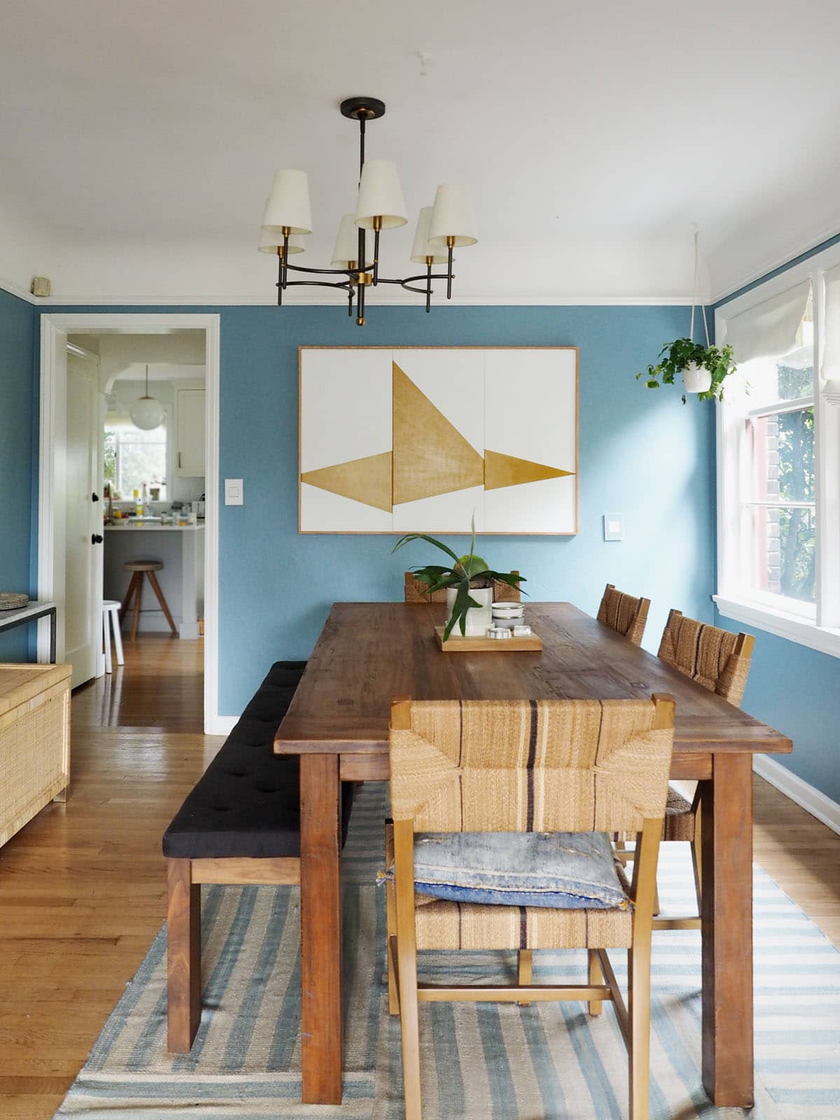 midcentury inspired dining room with blue walls | best blue paint colors roundup on coco kelley
