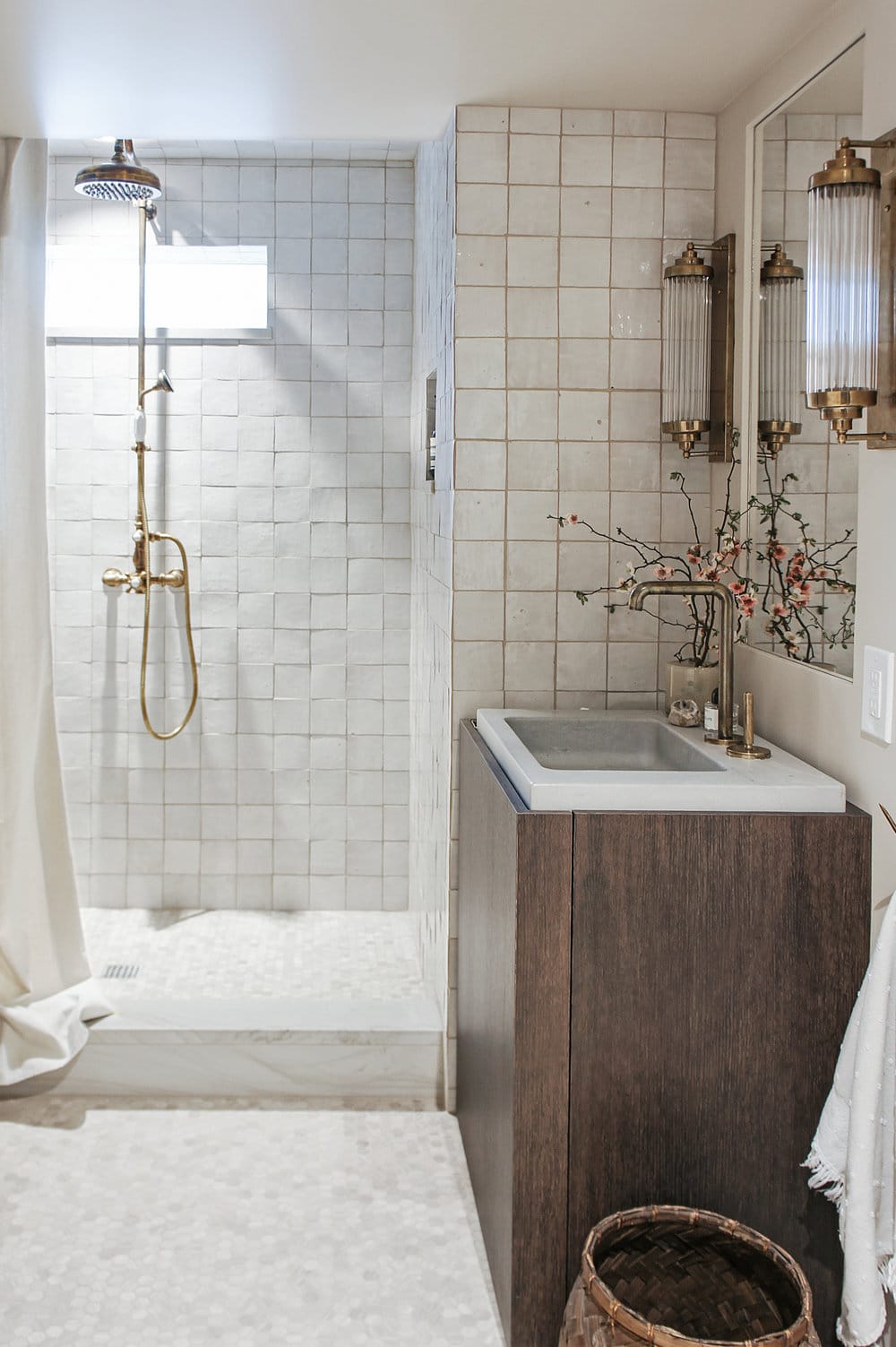brass cream and wood tones in a small earthy bathroom remodel