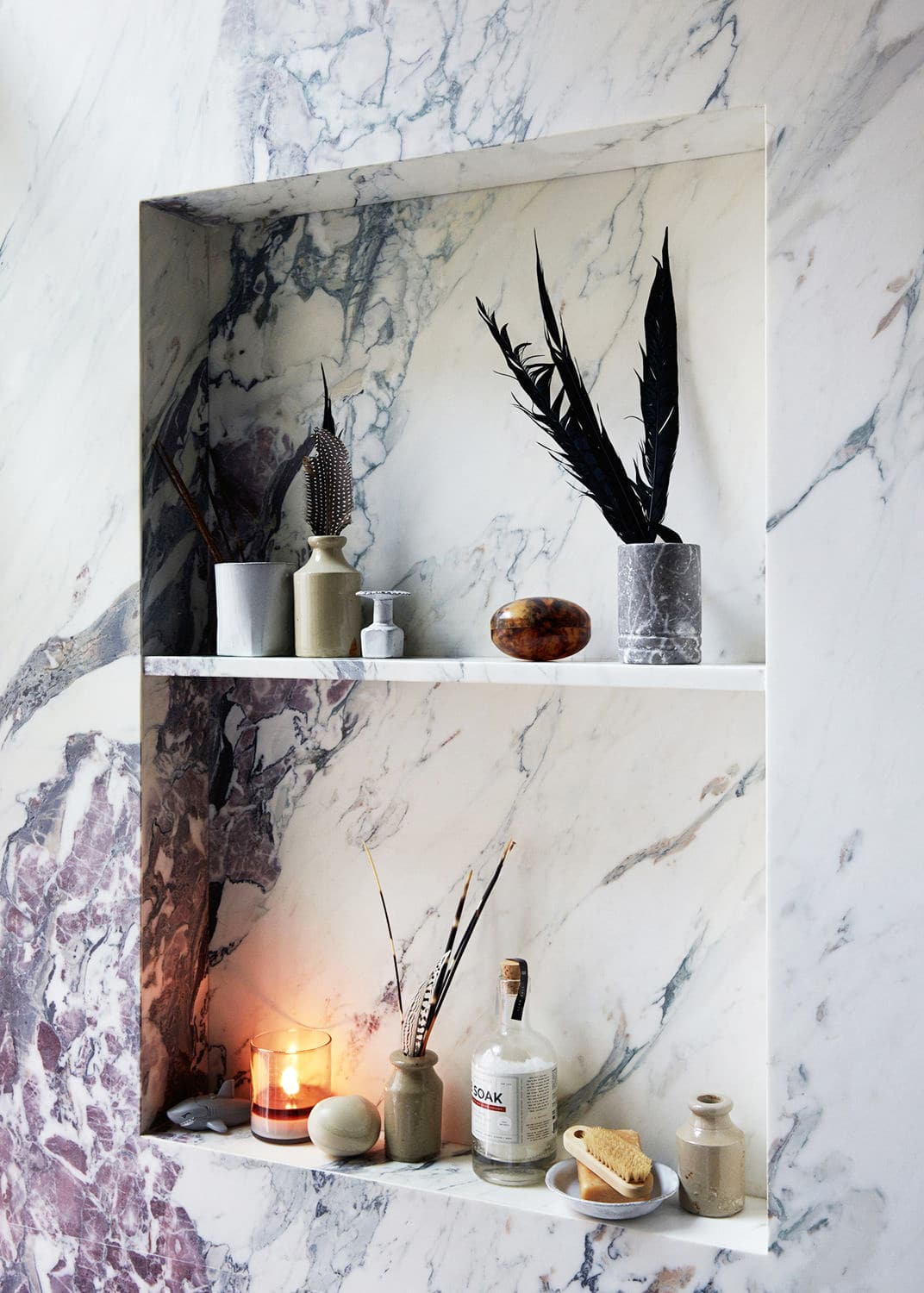 built-in marble shelving in the bath | jenna lyons house tour on coco kelley