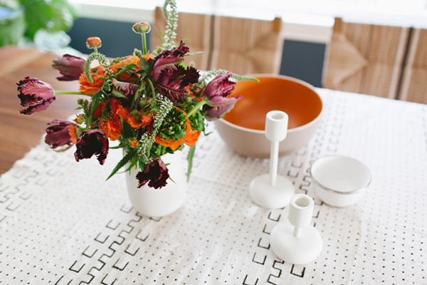 aubergine and orange florals on a mud cloth runner in the dining room // coco+kelley