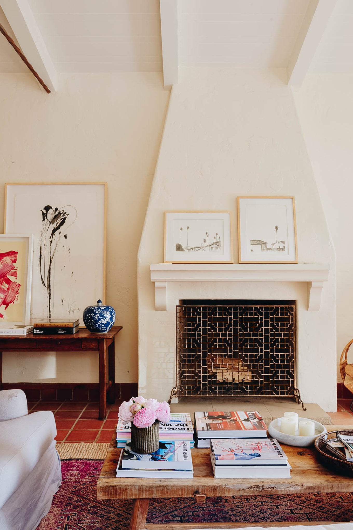 casual art on the mantel and styled coffee table | california hacienda house tour