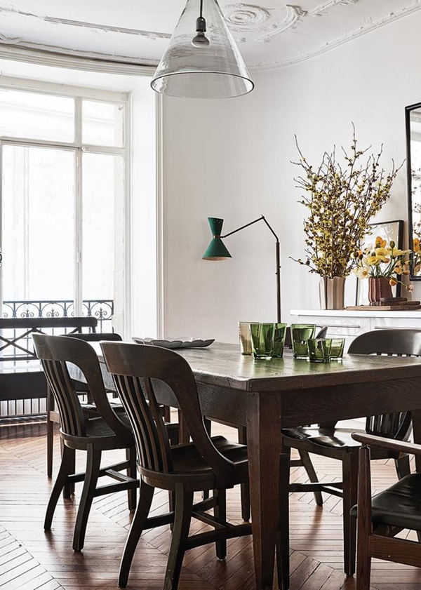 a cozy dining room with modern touches in this vintage chic parisian house tour via coco kelley
