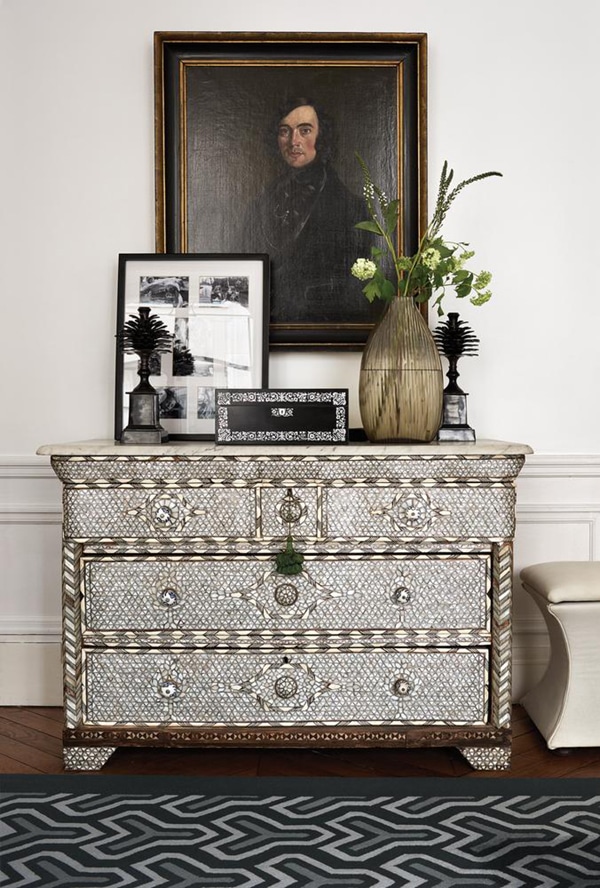 an antique inlay chest with perfectly styled accessories | vintage chic parisian house tour via coco kelley