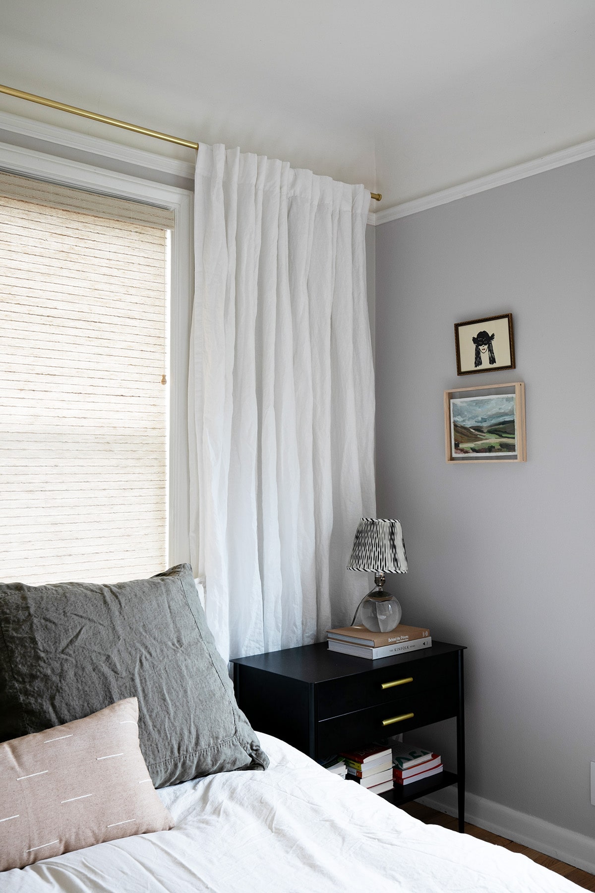 corner bedroom styling with minimal wall art