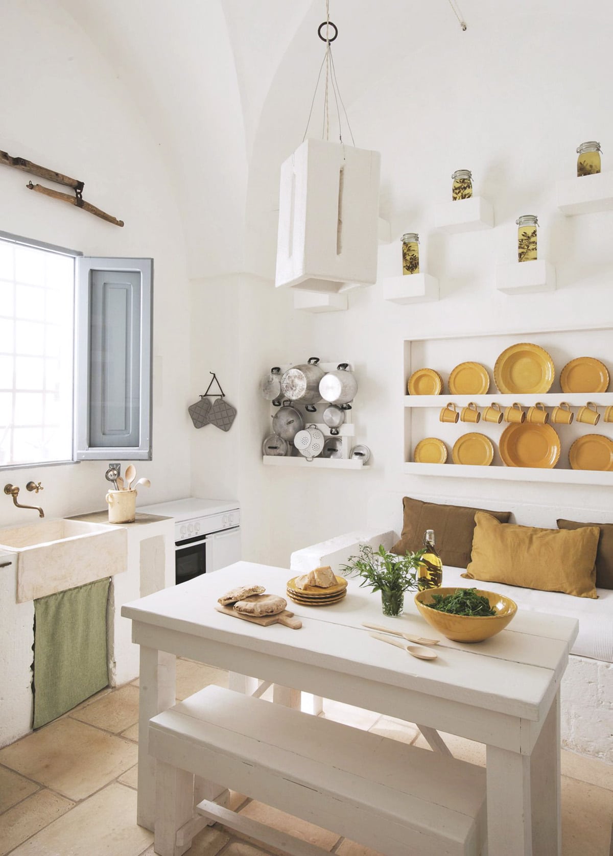 whitewashed kitchen in Masseria Scorcialupi in Puglia | tour on coco kelley