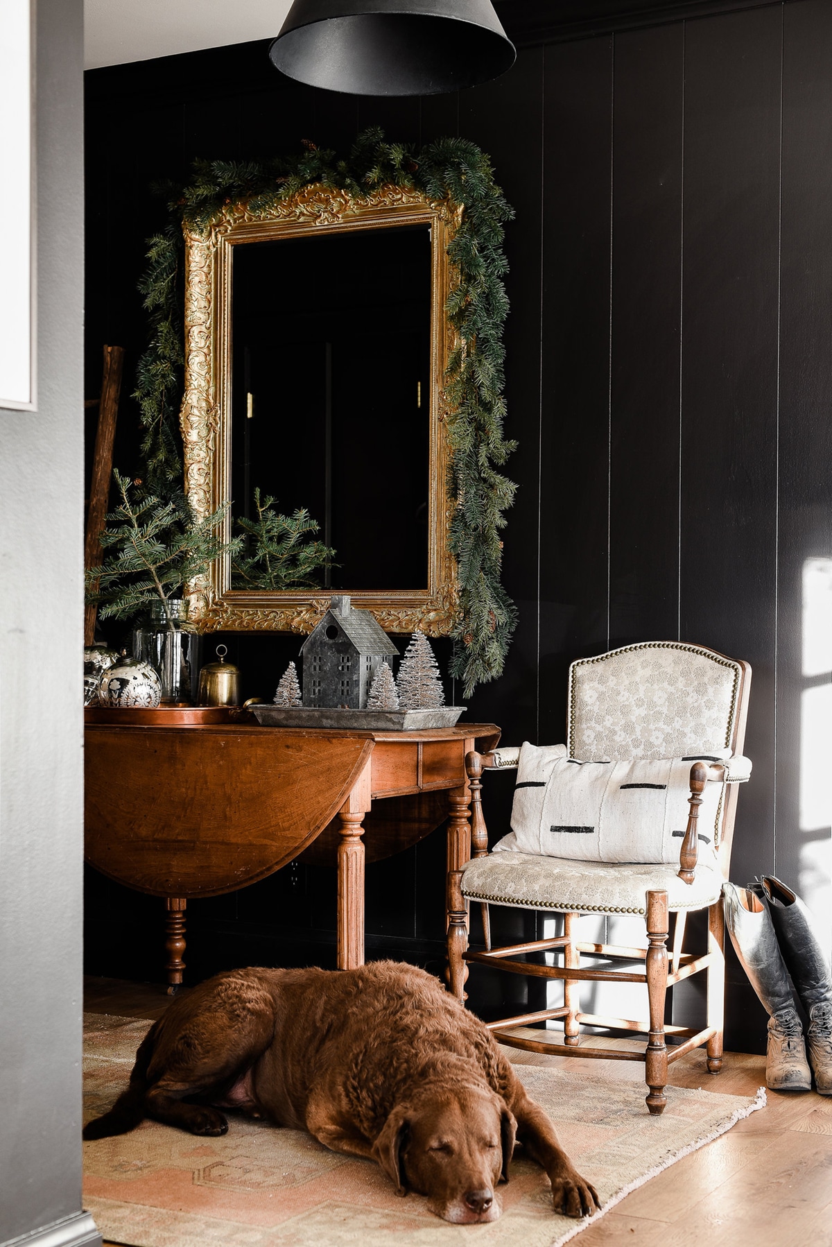 dark walls and green garland by boxwood avenue | our favorite holiday home decor on coco kelley