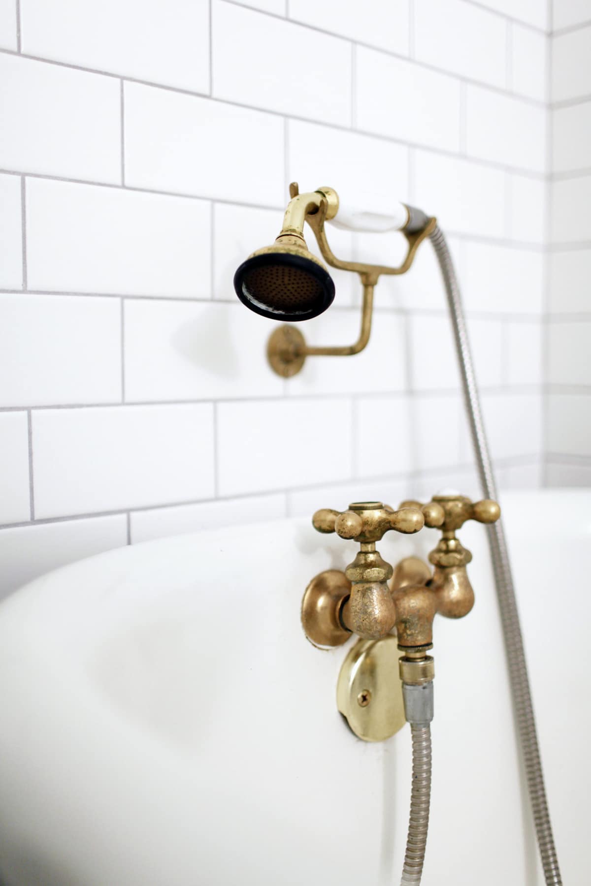 vintage brass bathroom hardware in a bathroom remodel | coco kelley
