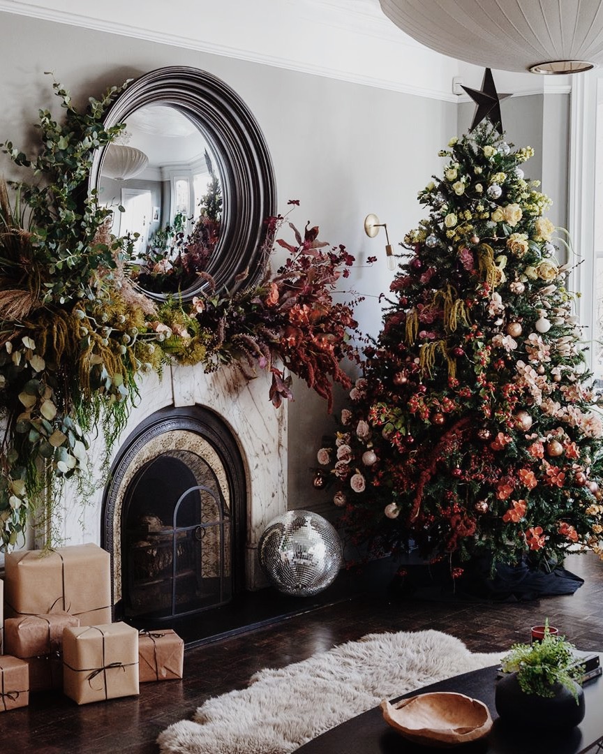 floral christmas tree and fireplace mantel installation from hello flora