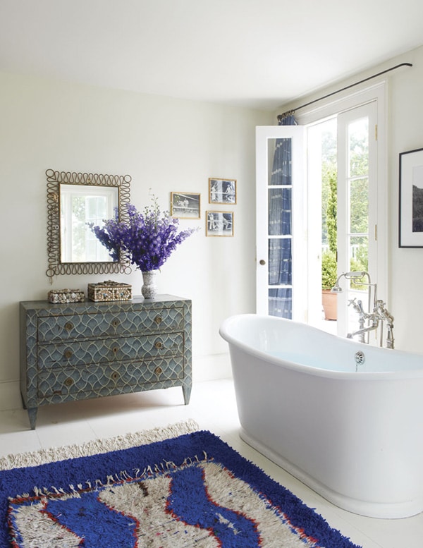 fresh bathroom with blue moroccan rug - refined boheme house tour via coco kelley