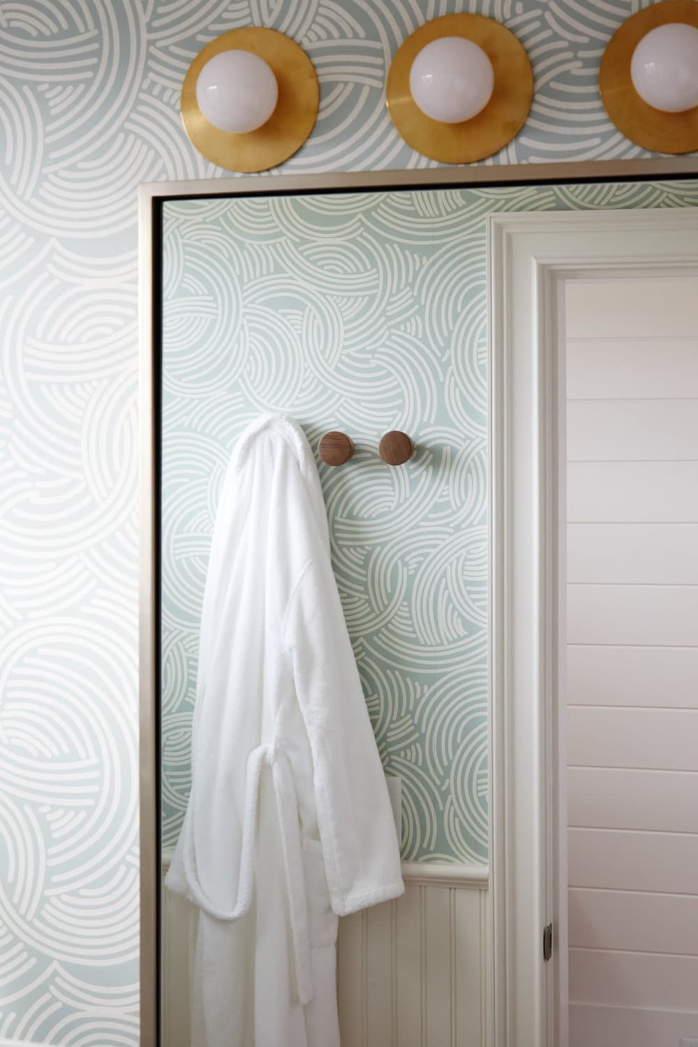 fun wallpaper in the bath | modern shaker beach house tour on coco kelley