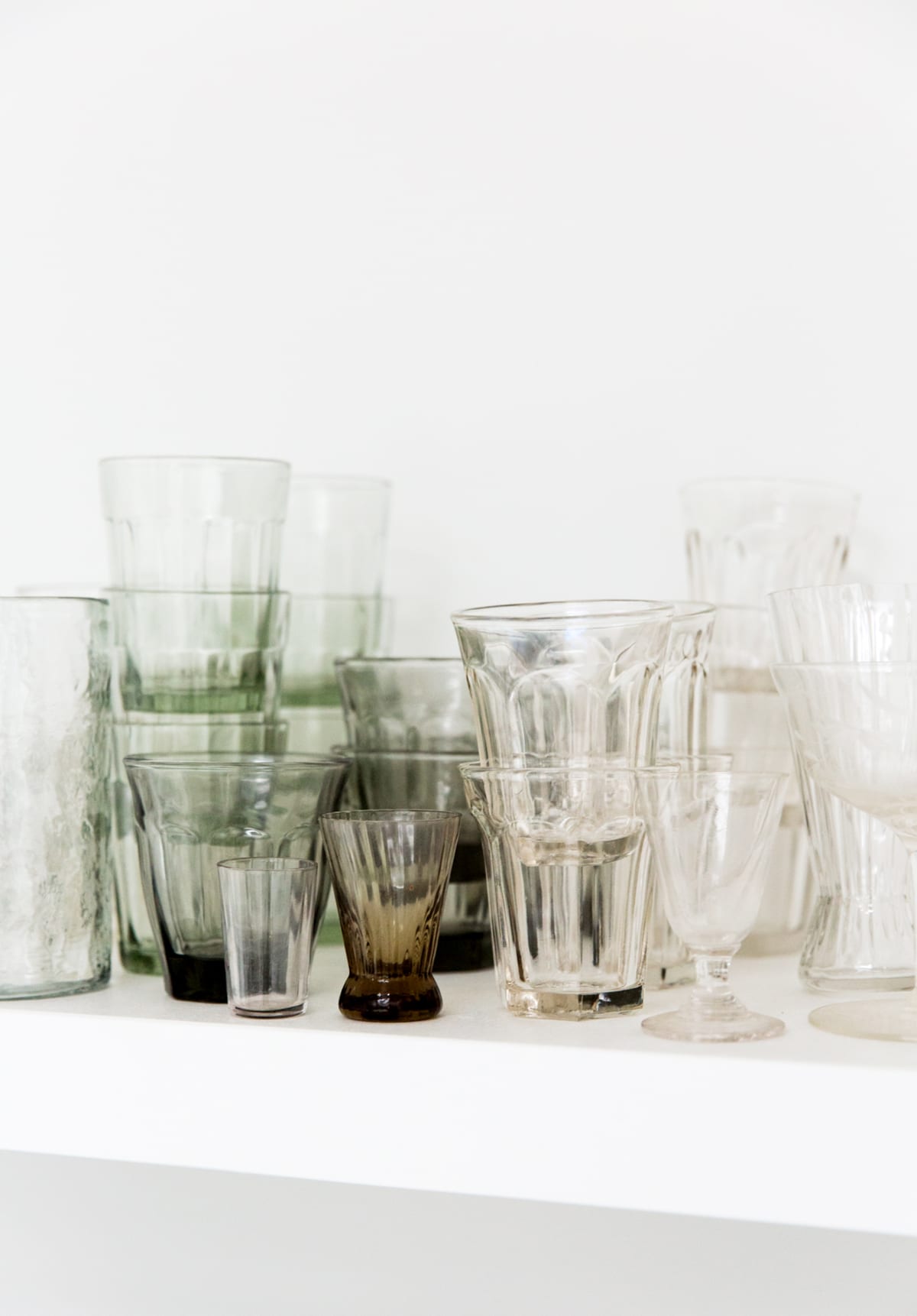 glassware organized by color in this backyard studio kitchen | coco kelley