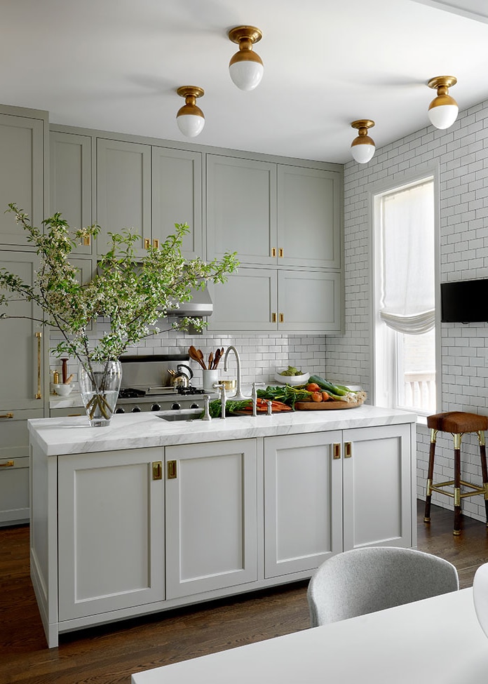 a classic grey kitchen with beautiful brass accents and flush mount lighting | design by lisa gutow on coco kelley