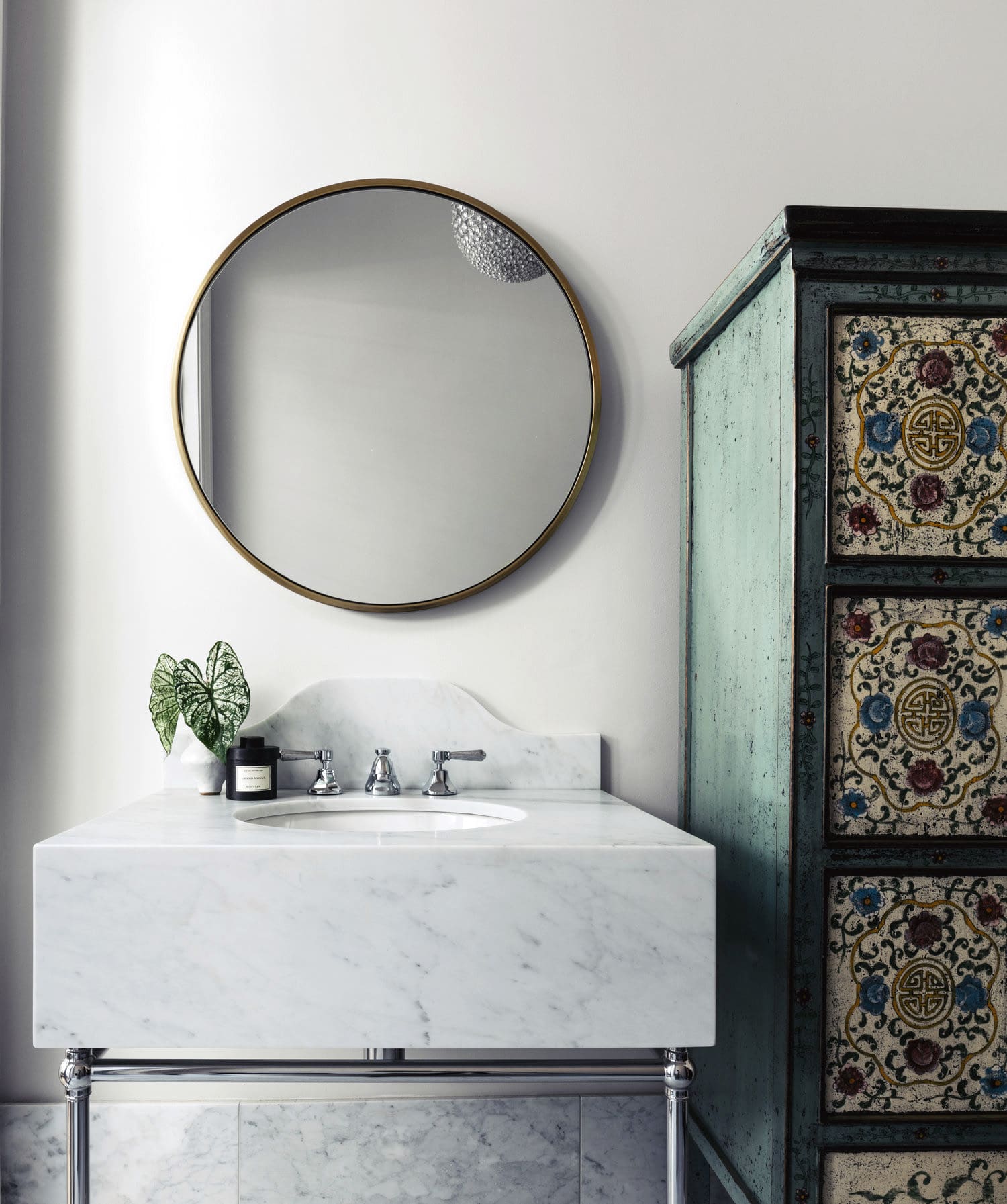 gorgeous marble sink and antique chest in the bath | house tour on coco kelley