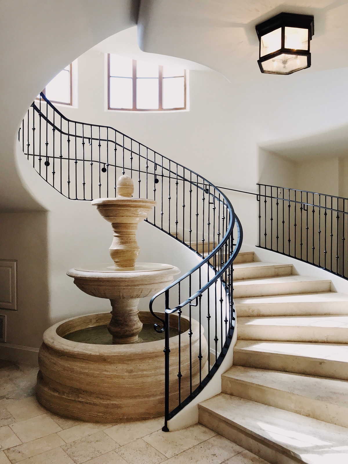 spiral staircase in european style leads to the spa at the posthotel in leavenworth | coco kelley