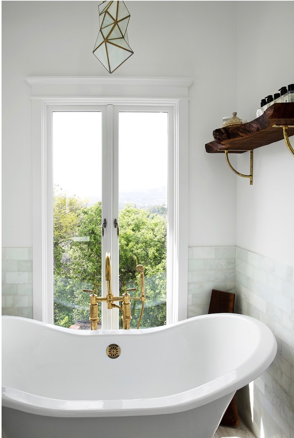 gorgous simple bath with open tub and faceted pendant | california style on coco kelley