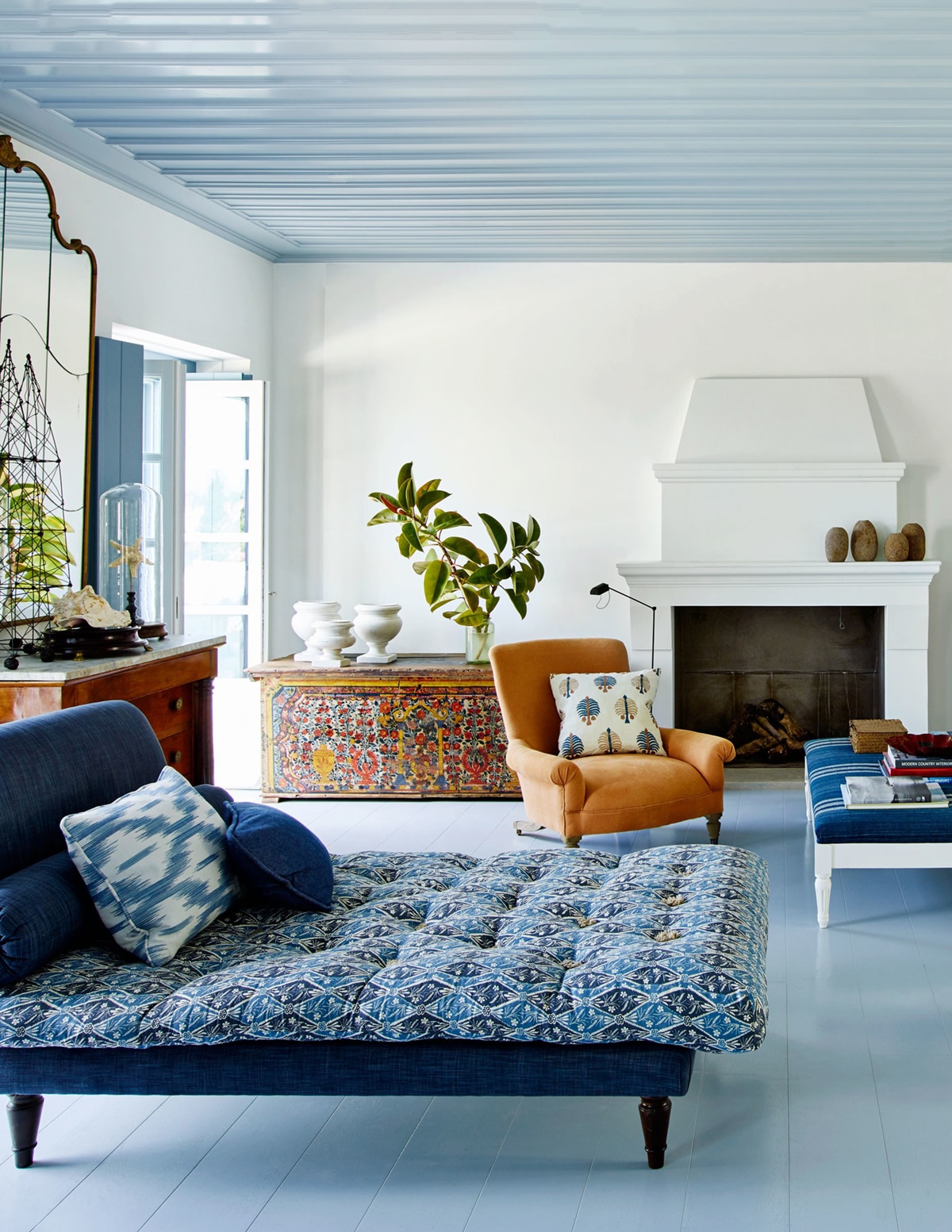 greek island living room in blue and orange | house tour via coco kelley